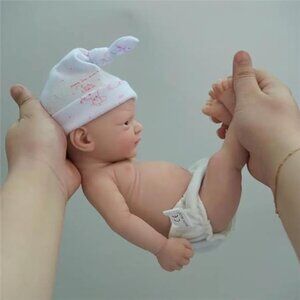 Reborn Baby Doll in Pink Printed Knot Hat and White Diaper